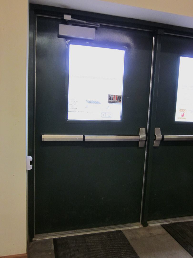 Large metal commercial door from inside